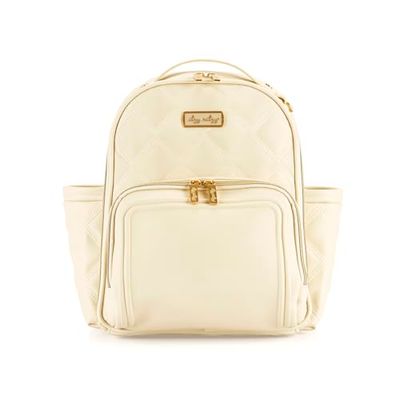 Itzy Ritzy Mini Plus blöjväska ryggsäck – elegant mini blöjväska ryggsäck med skötdyna, 10 totala fickor (6 inre och 4 externa), grepphandtag och gummifötter, mjölk & honung