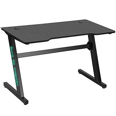 BAKAJI Bureau Gaming Porte-PC avec lumières LED RGB Changement de Couleur Structure Métal Plateau Bois Texture Fibre de Carbone avec Tapis Souris Mousepad Inclus 120 x 60 x 73 cm Jeu Online