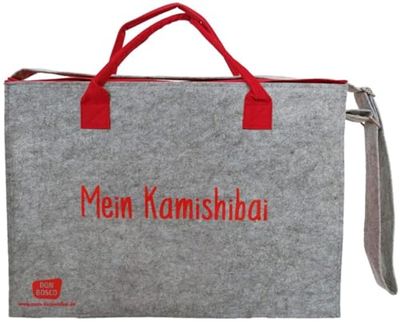Tragetasche und Umhängetasche "Mein Kamishibai": Modell 2022. Grauer Filz, rote Seitenteile, verstärkter Boden, Klettverschluss, zwei Tragegriffe für die Hand, längenverstellbarer Schulterriemen