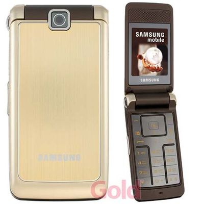 Samsung SGH S3600 - Teléfono móvil (cámara de 1,3 MP, reproductor de MP3, banda cuádruple), color dorado