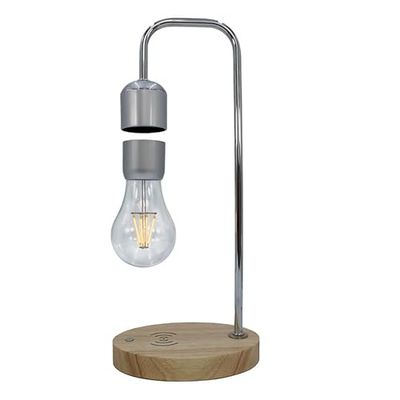 Levitante bureaulamp die ondersteboven zweeft. De magnetische basis bevat een draadloze oplader. Ideaal voor het decoreren van nachtkastjes of bureaus op een originele manier.