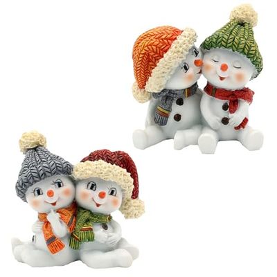 Dekohelden24 Set om 2 snöiga barn, med mössa och halsduk i rött, grått, orange och grönt, sittande (L x B x H) 5,5 x 3,5 x 5,5 cm