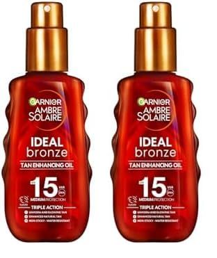 Garnier Ambre Solaire Ideal Bronze Protective Oil Sun Cream SPF15, High Sun Protection Factor 15, Shea Butter, Water Resistant & Non Greasy Sunscreen, UVA & UVB Protection, 150ml (Pack of 2)