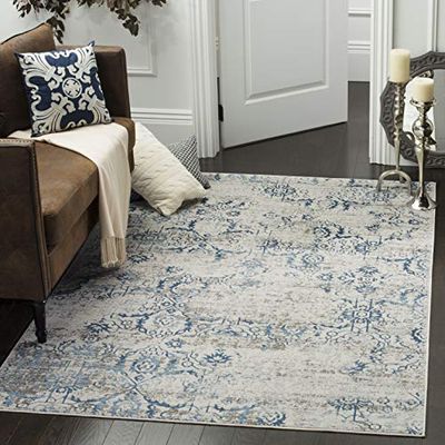 SAFAVIEH Tapis de Sol Vieilli pour Salon, Salle à manger, Chambre à coucher - Artifact Collection, Tapis à poil court, Bleu et crème, 91 X 152 cm