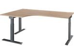 Schäfer Shop Select Winkelschreibtisch ERGO-T 2.0, 90° Winkel, Ansatz links, T-Fuß, B 2000 x T 1200/800 x H 675-895 mm, Eiche/anthrazit
