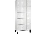 C+P Schliessfachschrank Cambio, 3 Abteile, 15 Fächer, auf Füssen, B 900 x T 525 x H 1980 mm, lichtgrau