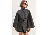 Ponchojas met striksluiting