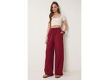 Weite Hosen mit Bindegürtel und Bindungsdetails