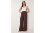 Weite Hosen mit Bindegürtel und Bindungsdetails