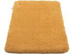 Badematte TOM TAILOR HOME "Cozy Bath UNI, Badvorleger, Badezimmer Teppich", gold, H:27mm, Polyester, Badematten, Badematte, Badteppich, Uni Farben, rechteckig, in rund & oval erhältlich