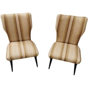 Petits fauteuils avec de hauts pieds en bois, années 50