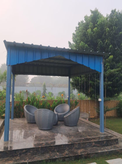 Outdoor Sitting Arrangement at Aarul Farmhouse