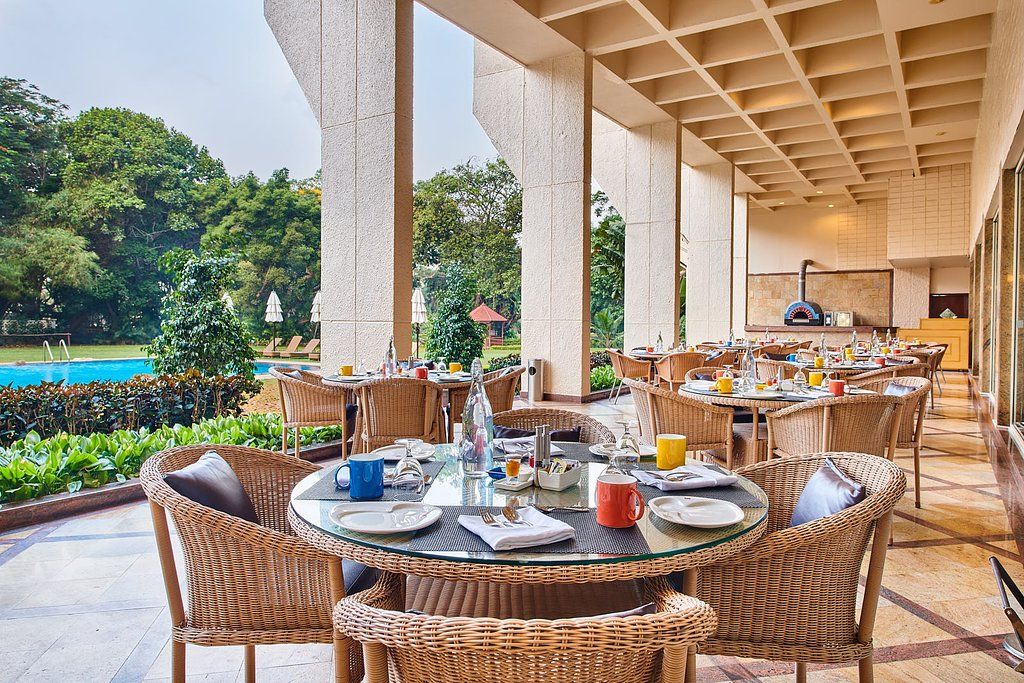 Outdoor Sitting Arrangement at Boardroom - The Lalit Ashok