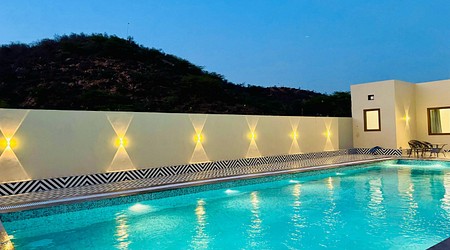 Outdoor Sitting Arrangement at Ekam Farmhouse