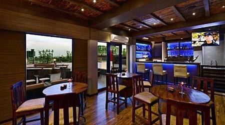 Arya Bar And Grill - Leisure Inn Grand Chanakya | Restaurant in MI Road, Jaipur