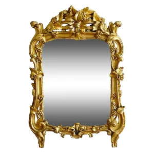 Miroir en bois doré, glace au mercure, travail Provencal d'époque Louis XV - Transition