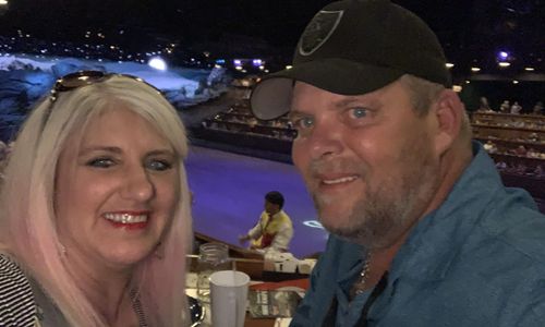 Couple Enjoying Dinner at Dolly Parton's Stampede Dinner Show Pigeon Forge