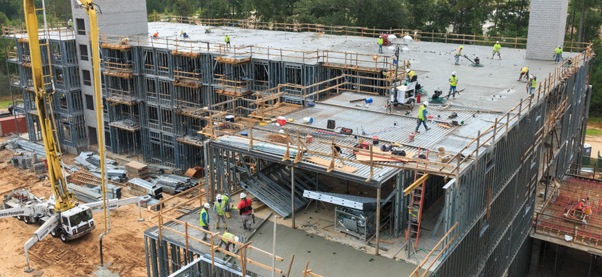 Springwoods Village multi-story apartment building under construction