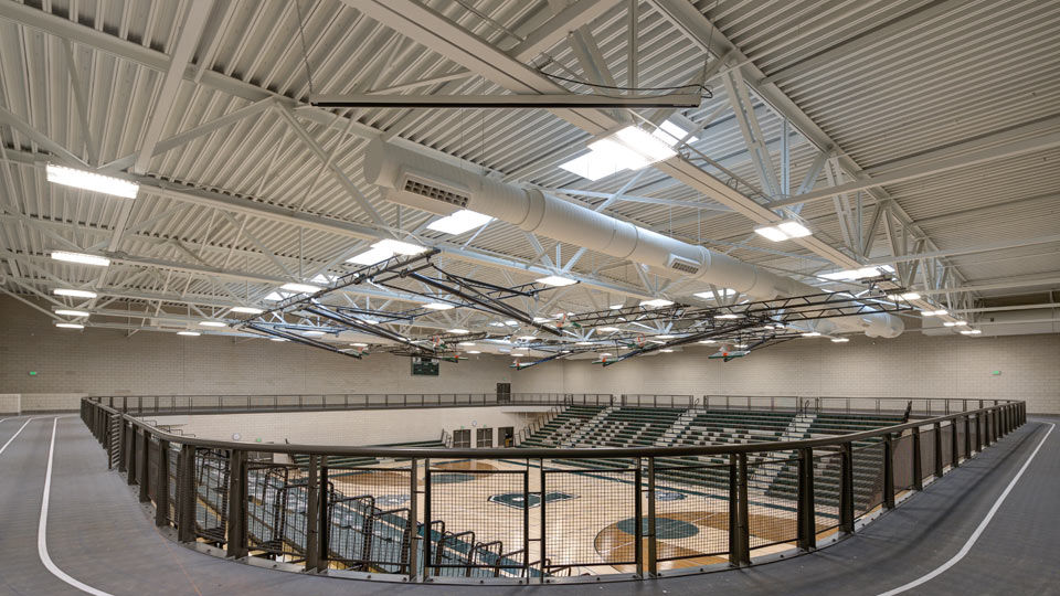 Gynmasium and second-level running track with steel joist and deck