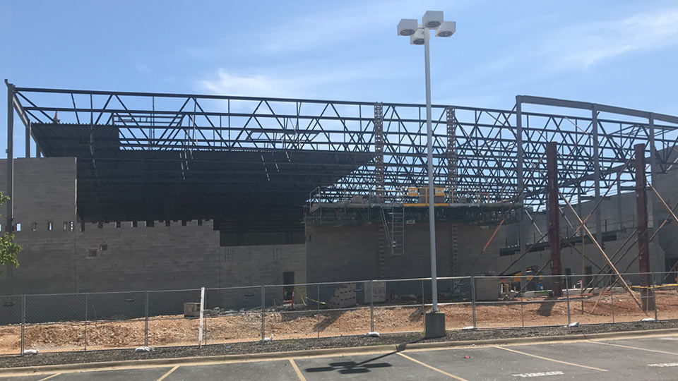 Outdoor photo of construction showing joist girders