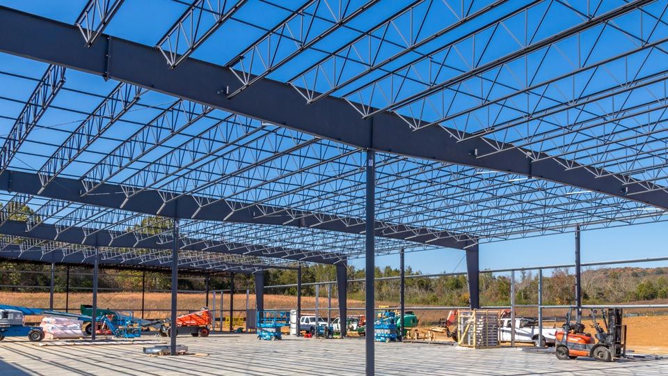 Metal bulding under construction with steel joists in place