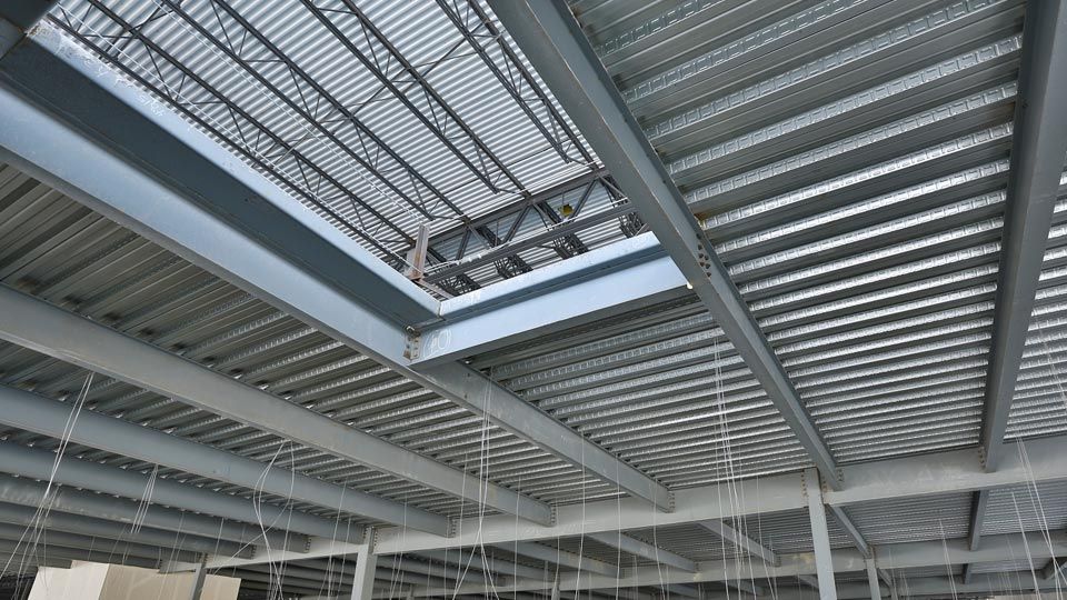 Composite deck on steel beams for second floor mezzanine