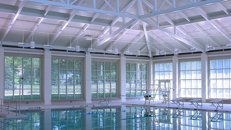 Interior of competition pool with painted Versa-Dek® Acoustical roof deck