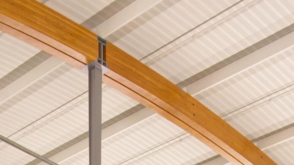 Close-up of Curve-Dek® Acoustical on wood beams