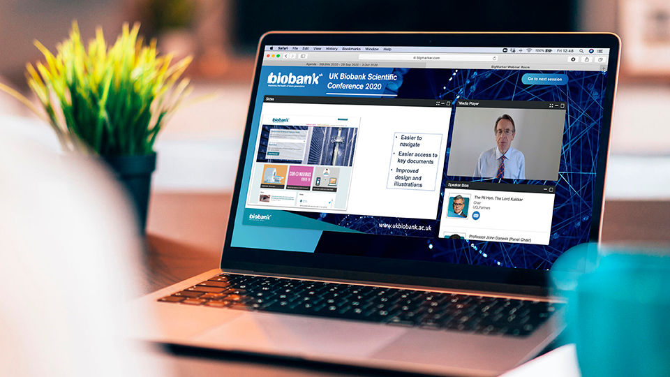 Over the shoulder view of someone looking at the BioBank website on a laptop