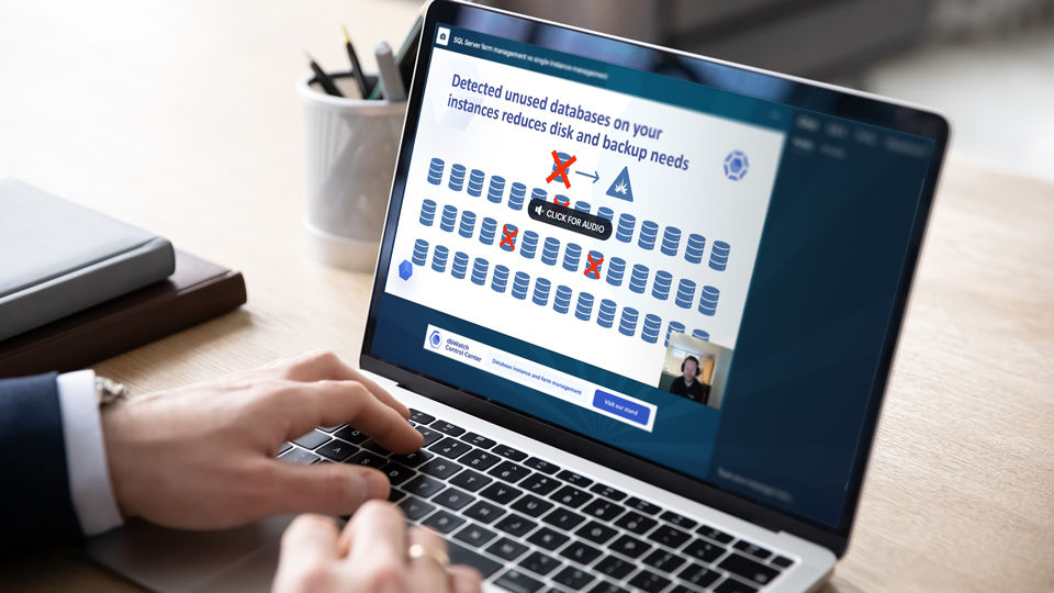 A person sitting down drinking coffee, looking at a laptop with the ServiceNow website on the screen