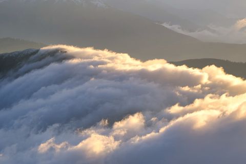 clouds over mountains at sunset