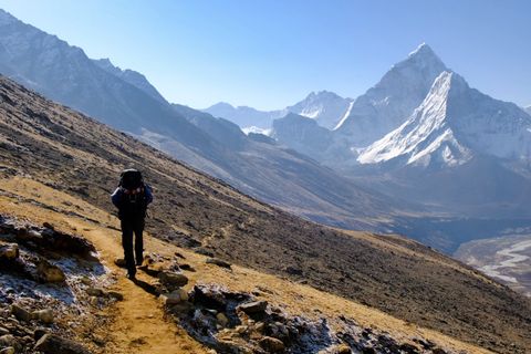 hiker walking towards ama dablam