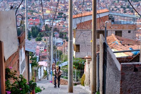 hiker ascending staircase in local neighborhood