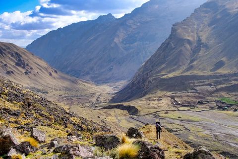 hiker climbing hill