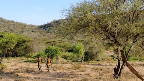 hadzabe tribe children walking