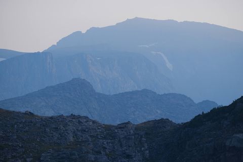 cascading rocky mountains at dawn