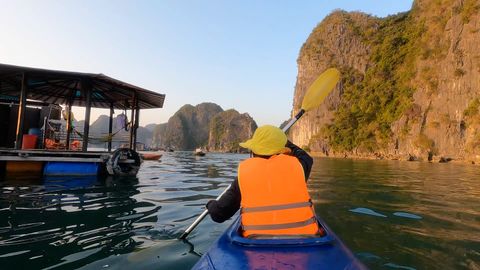 kayaking around floating house in lan ha bay