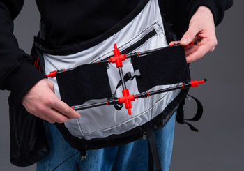 <p>The power frame unfolds with the use of fiberglass tent poles. The user can then attach the velcro sleeves, to which they can attach their flight instruments on the horizontal bottom face of the bag. </p>