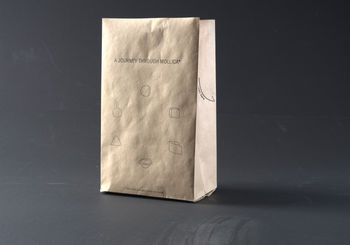 <p>The final solution merges packaging and communication into a single&nbsp;<br>touchpoint: a traditional paper bread bag. Rather than creating a sepa<br>rate, formal instruction manual, I chose to elevate this everyday object.&nbsp;<br>The surface of the bag is printed with designed graphics that serve as&nbsp;<br>a visual guide. Furthermore, the bread bag is no longer just a disposable&nbsp;<br>wrapper; it becomes the interactive interface of the entire project, invit<br>ing people to turn a simple loaf of bread into a structured sensory ritual.</p>