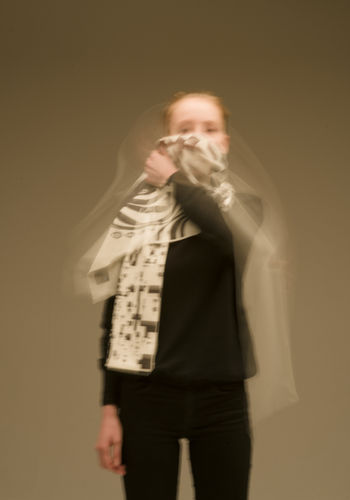 <p>.02 can be worn as a casual white scarf or as an anti-facial recognition device, just by switching side. The applied graphics are inspired to first world war boats’ patterns, which help to hide the shapes and volumes of what is underneath.<br /><br />
.02 is part of Sly’s first clothing collection.</p><br />