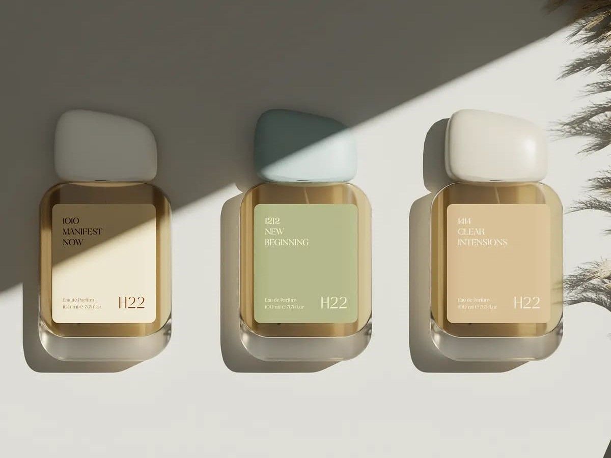 Minimalist white luxury packaging with clean typography and gold accents