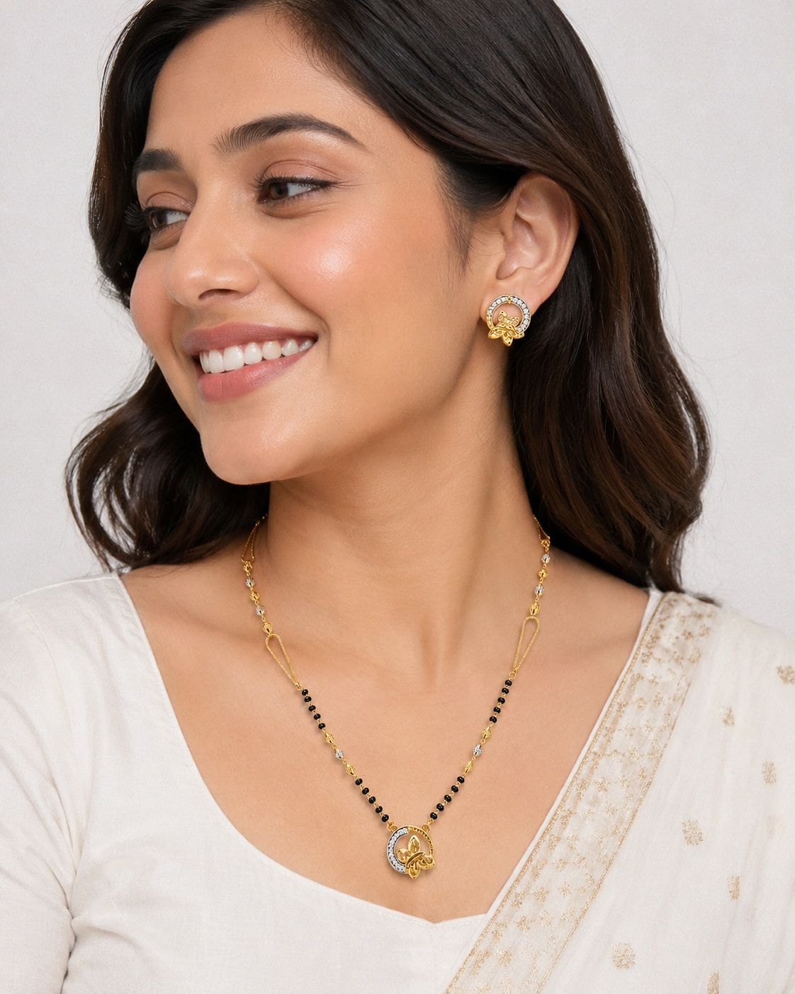 Gold Ganthan Plated Butterfly Mangalsutra Set With Matching Earrings - CGA61399 detail view