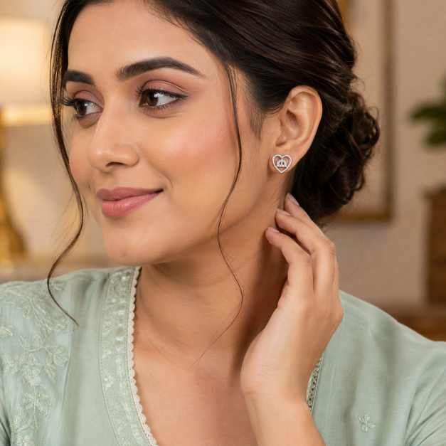 Silver Heart-Shaped Stud Earrings With Clear Stone Detailing - SEAR60103 close-up view