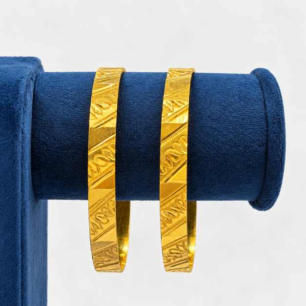 Gold Engraved Patterned Pair Of Bangles - CBA11425