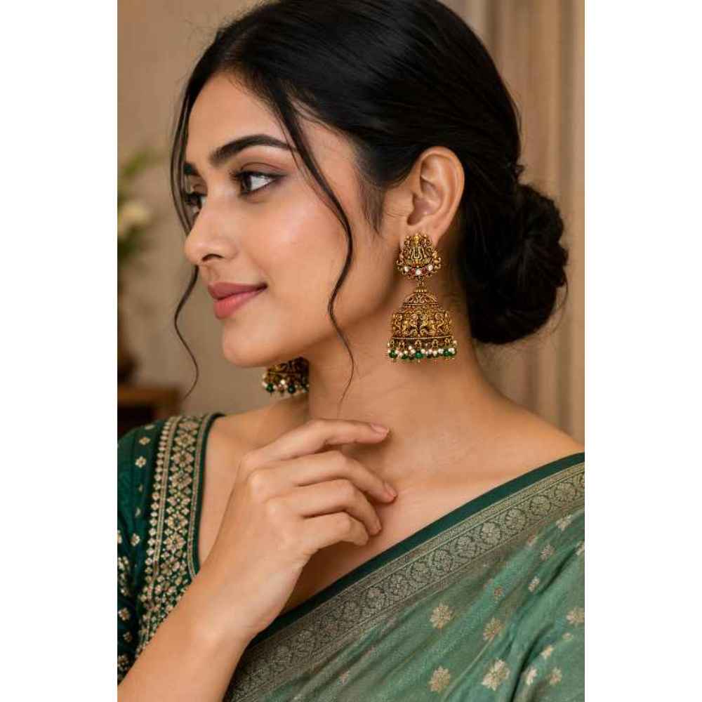 Silver Traditional Temple Jhumka Earrings With Intricate Deity Motif - SEAR60798 close-up view