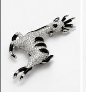 Sterling Silver Deer Brooch with Cubic Zirconia & Black Enamel Detailing close-up view