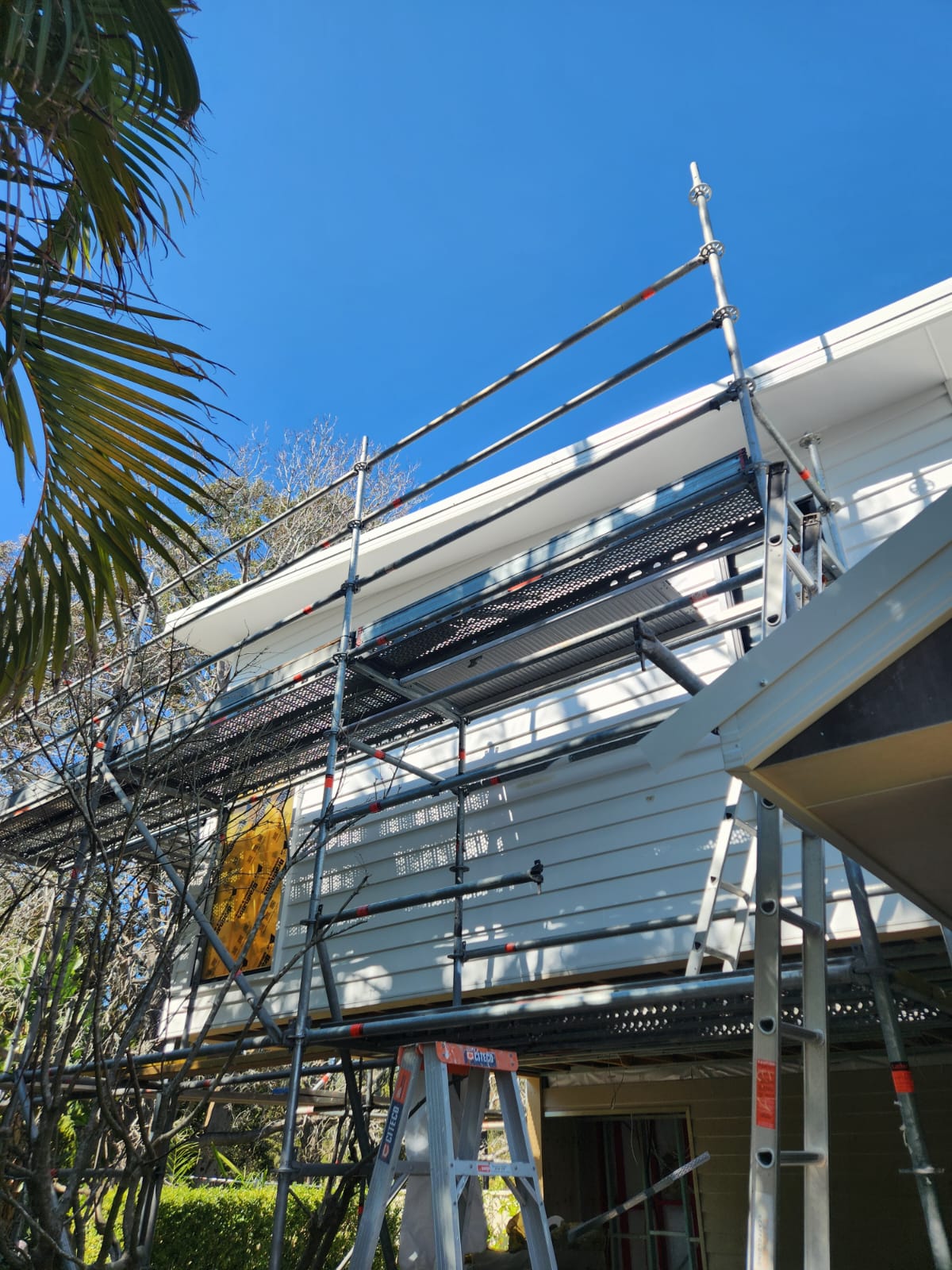 Scaffolding set up around a coastal Newcastle home for an exterior repaint