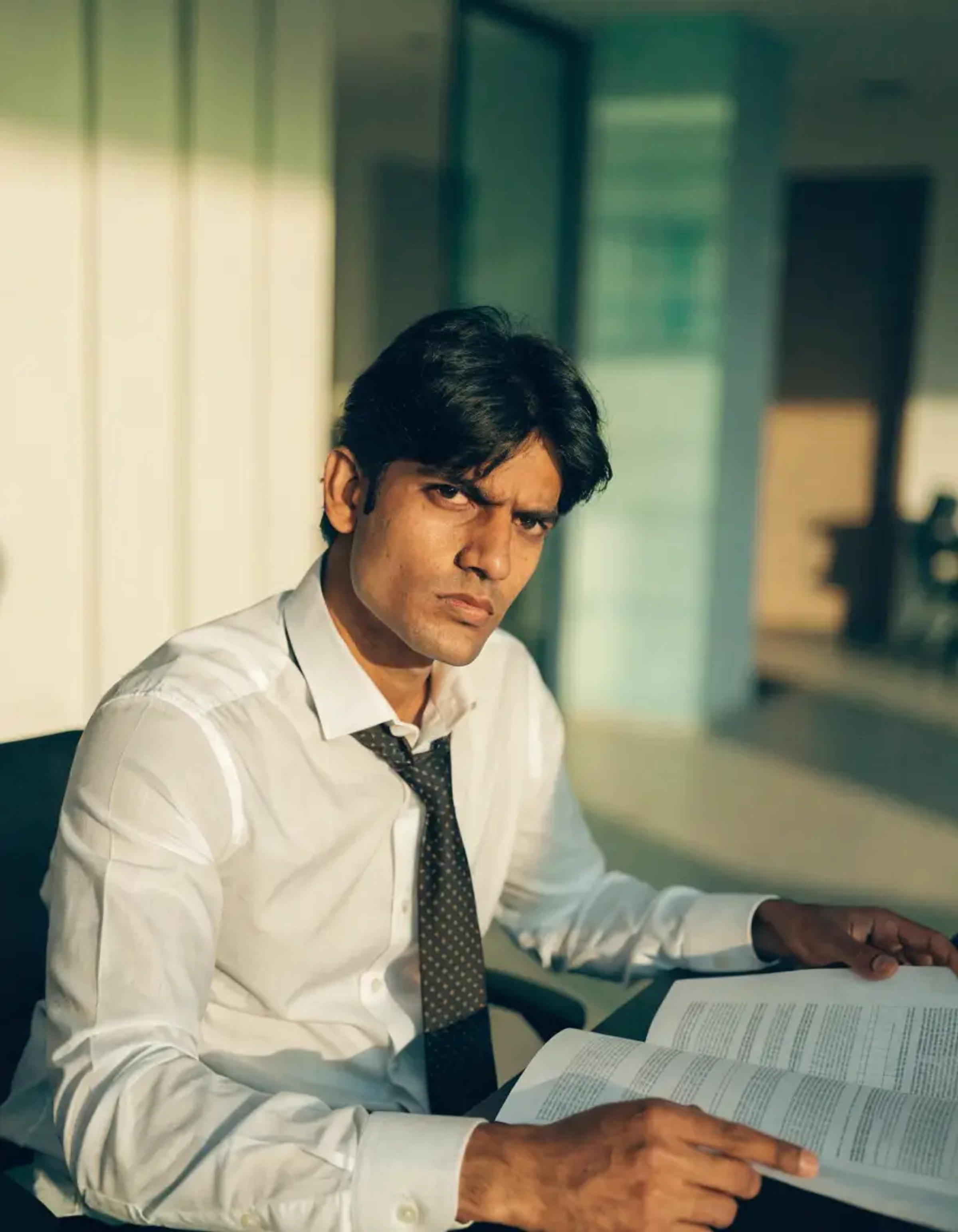 Yenepoya Online MBA in Public Administration learner studying a policy document
