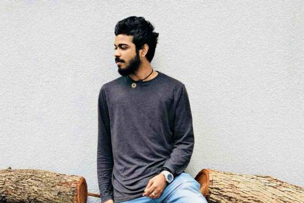 A 22-year-old died after falling from the fourth floor of a building early Sunday morning