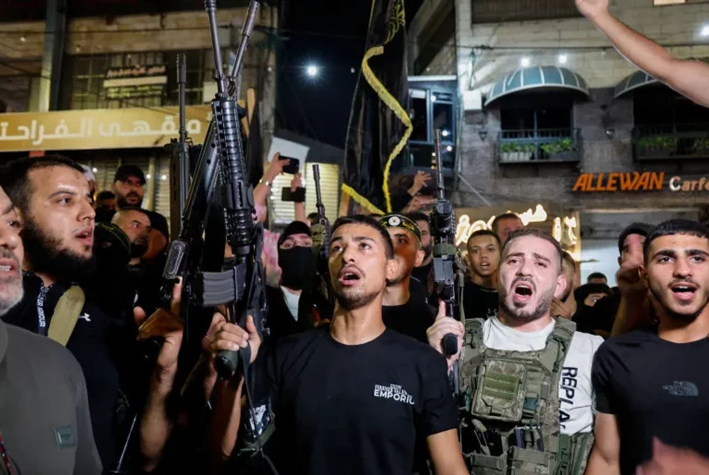 ފަލަސްތީނުގެ ހަތިޔާރު އެޅި ގްރޫޕެއް ޖެނިންގެ މަގުތަކުގައި މުޒާހަރާއެއްގައި ބައިވެރިވަނީ